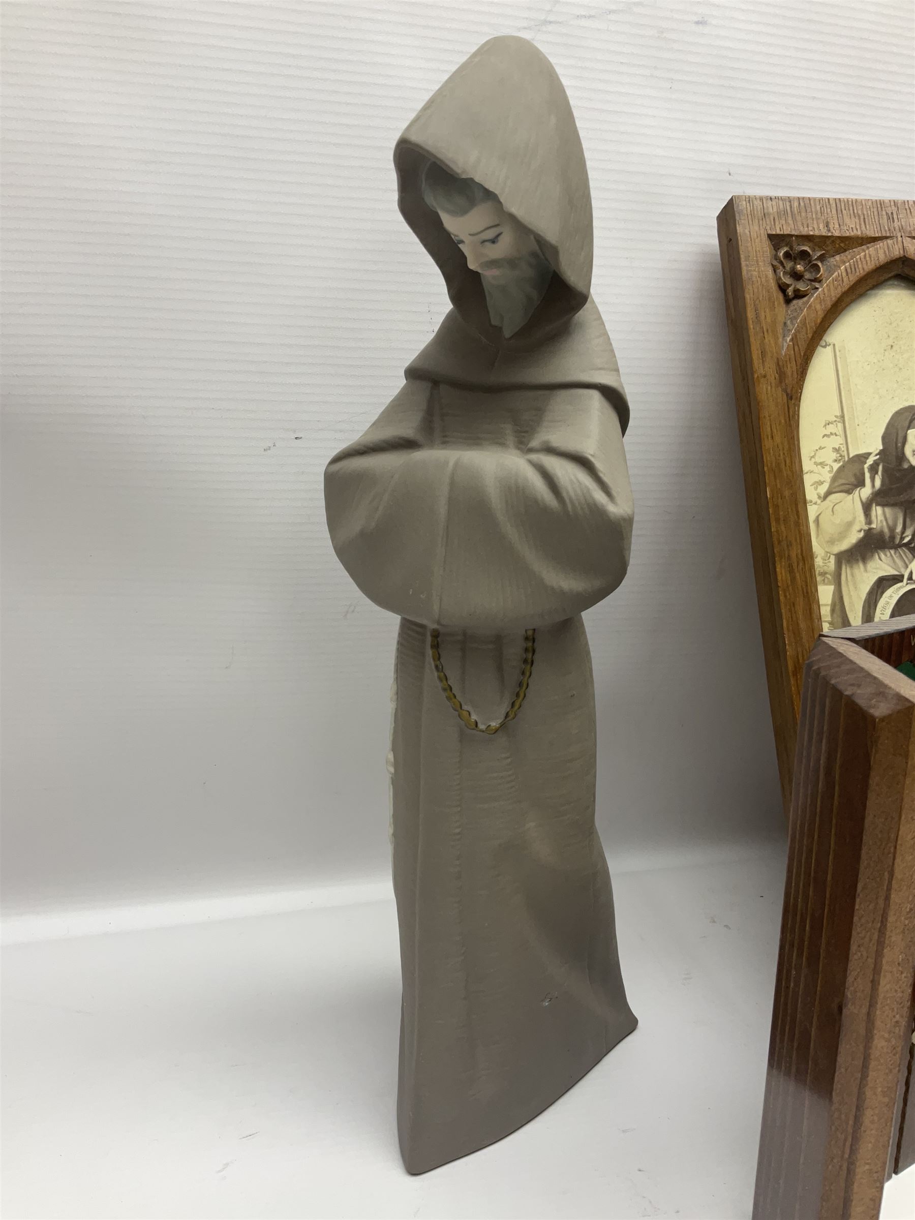 Franklin Mint House of Faberge 'The Nativity' ceramic egg, together with a Russian doll decorated with nativity scenes, Cinque Ports Pottery monk salt and pepper shaker and other monk figures, etc