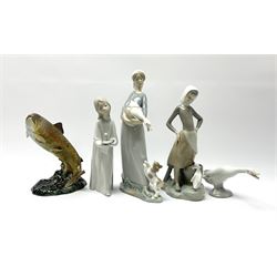 A group of four Lladro figures, comprising an example modelled as a young woman carrying a goose with playful dog at her feet, other examples modelled as a young girl holding a candle, a girl with milk pail and goose by her feet, and a goose, together with a Beswick trout, no 1032.