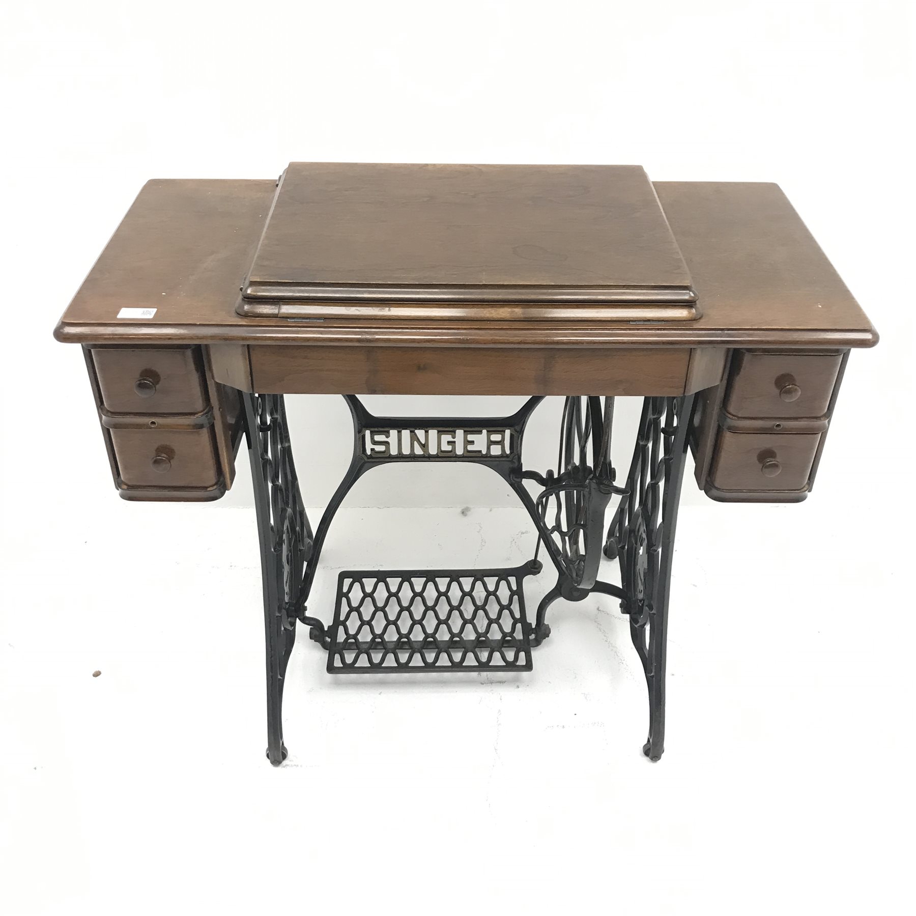 Singer Treadle sewing machine, four drawers, wrought iron base, W91cm