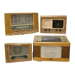 Four mid 20th Century Pye radios, comprising PE80 'The Cambridge International' example with walnut inlay panelling, 1955 Pye Fenman II example with walnut veneered case and two further similar smaller, largest H44cm W59cm D24cm

