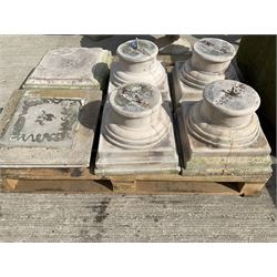 Set of four cast stone architectural columns, tapering form, on square plinth bases