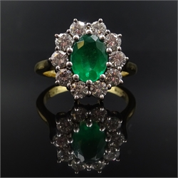  Emerald and diamond cluster ring, hallmarked 18ct  