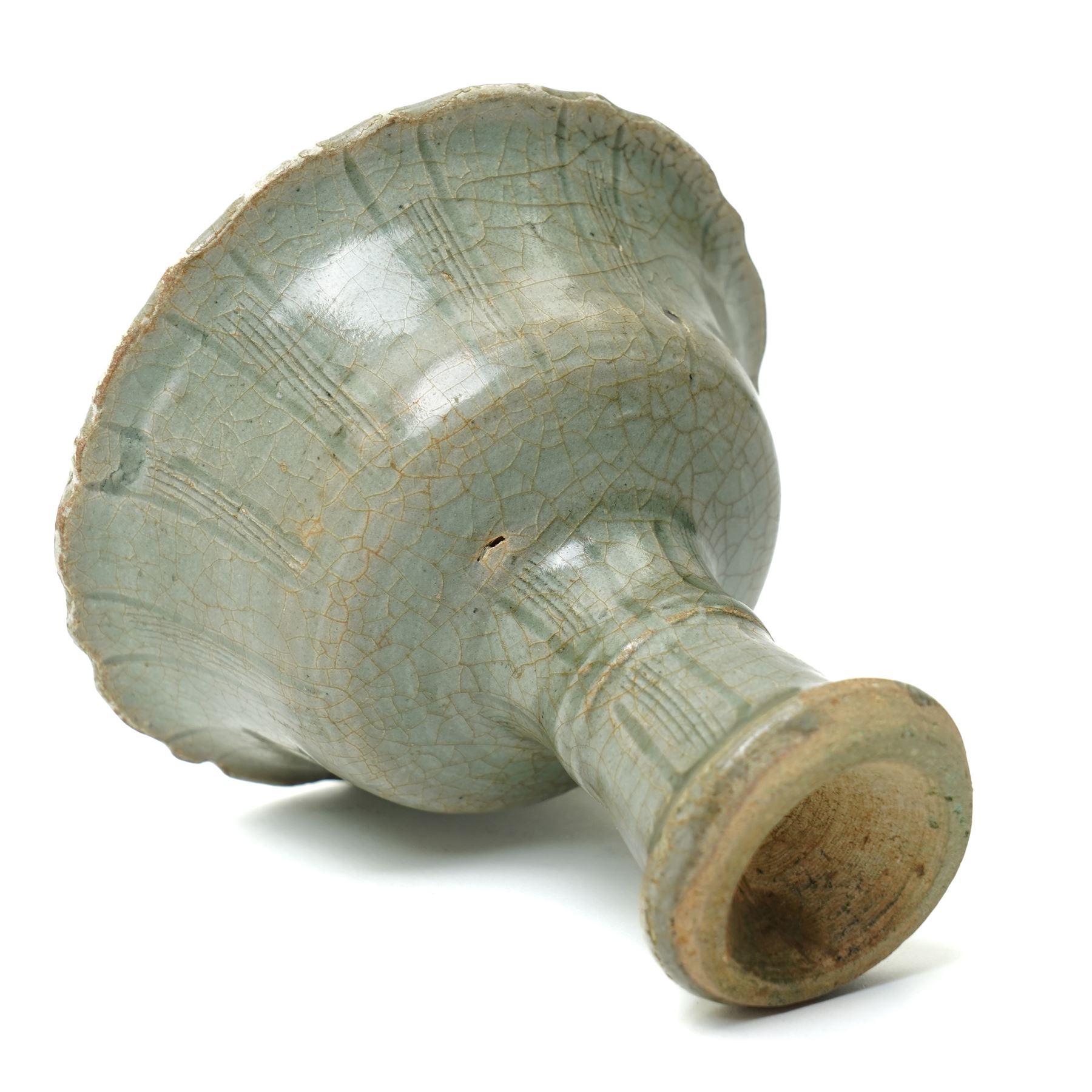 Chinese Ming dynasty Longquan celadon stem cup, of flared form rising from a splayed foot, incised decoration to stem and bowl, with fluted rim, unmarked, H10cm