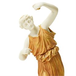 Pair of Royal Worcester figures of female musicians modelled by James Hadley, one with cymbals, decorated in gilt and on circular bases H33cm  