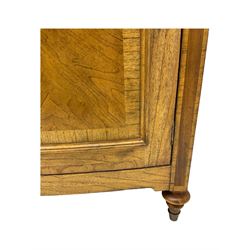 Frank Hudson - mid-20th century Mindi ash and burr walnut double wardrobe, moulded rectangular cornice over two panelled doors with chevron pattern veneers, raised on turned supports