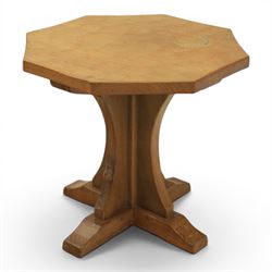 Mouseman - adzed oak octagonal occasional table,  raised on a quatriform base with carved mouse signature, by the workshop of Robert Thompson, Kilburn