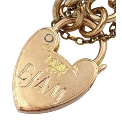 Early 20th century 9ct gold four bar gate bracelet with heart padlock clasp, engraved with initials 'E.J.A.M' verso, stamped 9ct 