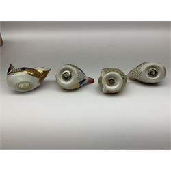 Four Royal Crown Derby paperweights, comprising Wren, Jenny Wren, both with gold stoppers, Goldcrest and Wren both with silver stoppers