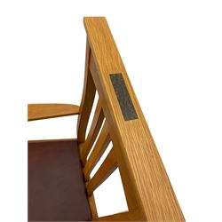 Pair of solid oak Arts and Crafts style carver chairs, inlay to top rail, drop in seat