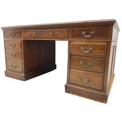 Late Victorian mahogany twin pedestal desk, , rectangular top with inset leather writing surface, fitted with central frieze drawer and eight flanking graduating drawers