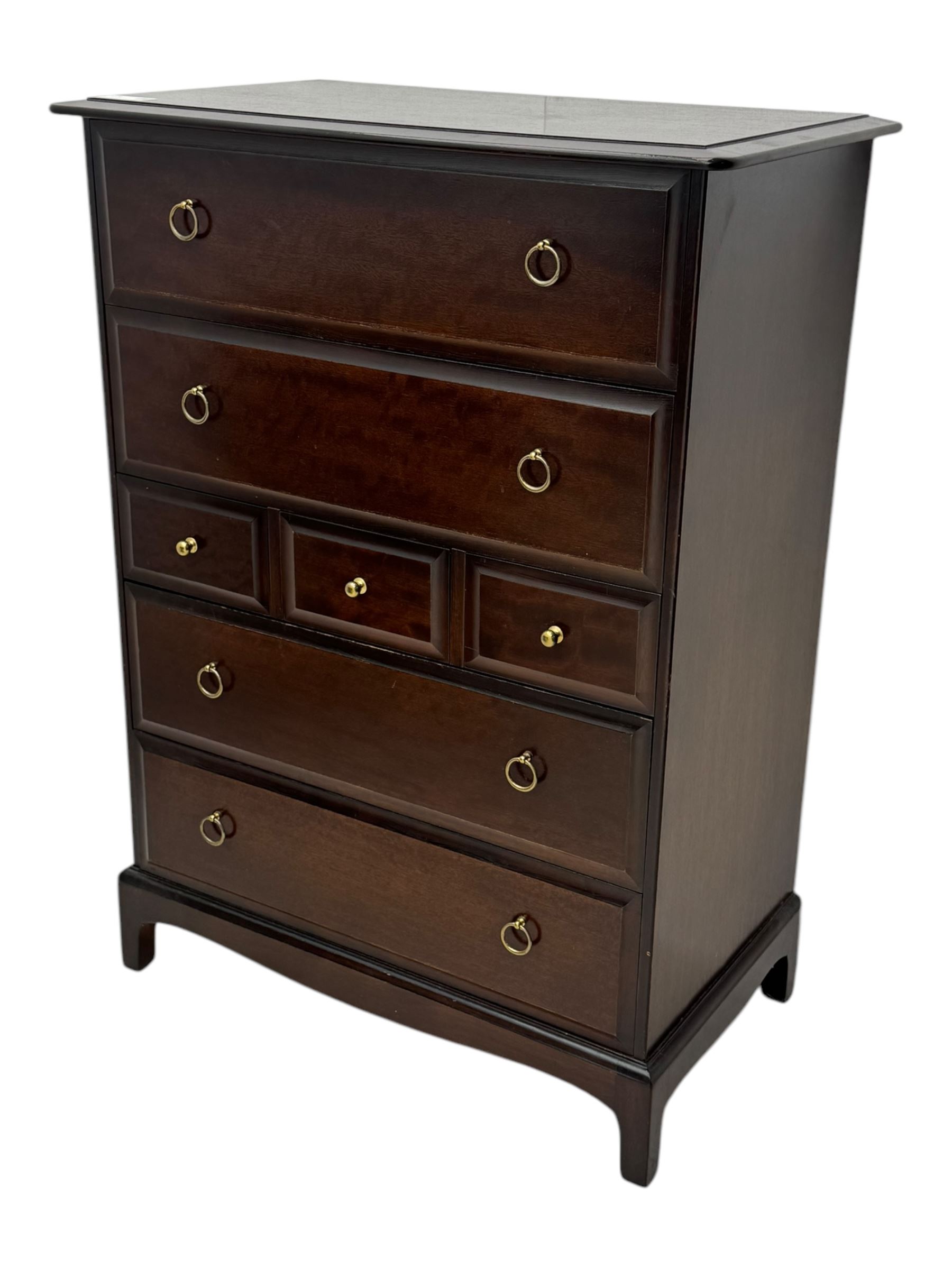 Stag Minstrel - mid-20th century chest, rectangular top over arrangement of three short and four long drawers, on bracket feet