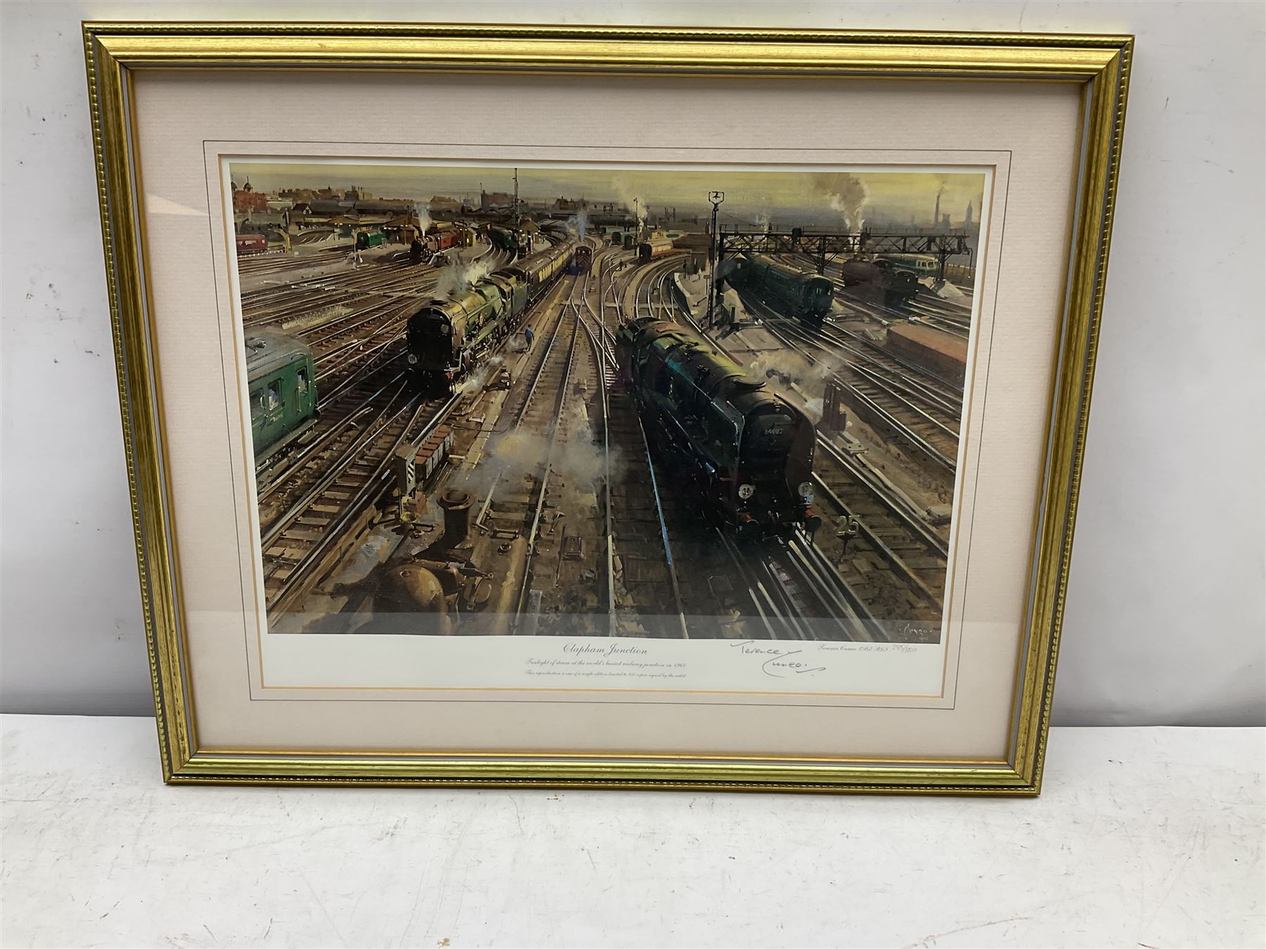 Terence Cuneo (British 1907-1996): 'Clapham Junction', limited edition chromolithograph signed and numbered 285/850, certificate verso 31cm x 41cm 