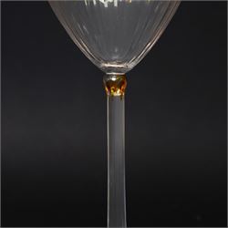 Otto Prutscher (1880-1949) - pair of early 20th century crystal wine glasses with citrine coloured ovals to the bowl and yellow stained at the top of the stem on a trumpet shape foot H21cm Notes: The glasses were probably made at the Meyr's Neffe glassworks, Adolf, Bohemia for the retailer E Bakalowits & Sohne, Vienna circa 1909