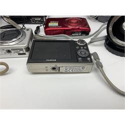 Nikon Coolpix 8700 camera body, serial no 3220838, with Zoom Nikkor Ed 8.9-71.2mm 1:2.8-4.2 lens, together with Canon digital video camcorder and other digital cameras and camera equipment