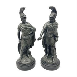  After Edouard Drouot pair of bronzed figures modelled as Roman soldiers, wearing plumed helmets and typical dress, signed E Drouot to the base, each raised on a circular base, H48cm