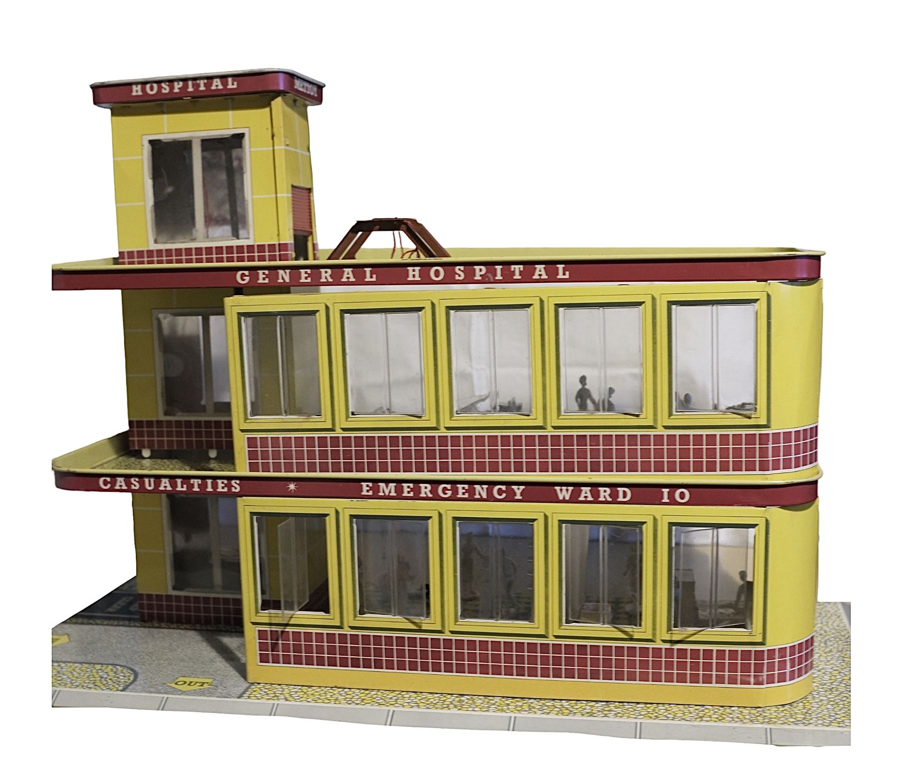 Late 1950s/early 1960s Mettoy tin-plate Emergency Ward 10 hospital set from the TV series, including over twenty figures, over sixty pieces of hospital equipment, beds, chairs, lockers, theatre fittings, stretchers etc; building is complete with movable transparent partitions, operating lift with sliding lift shaft doors and opening windows; wards with fitted swing doors; tin-plate walls with lithographed detail in yellow with red and white tiled effect, cobbled base with ambulance casualties area and lift access; boxed with instructions