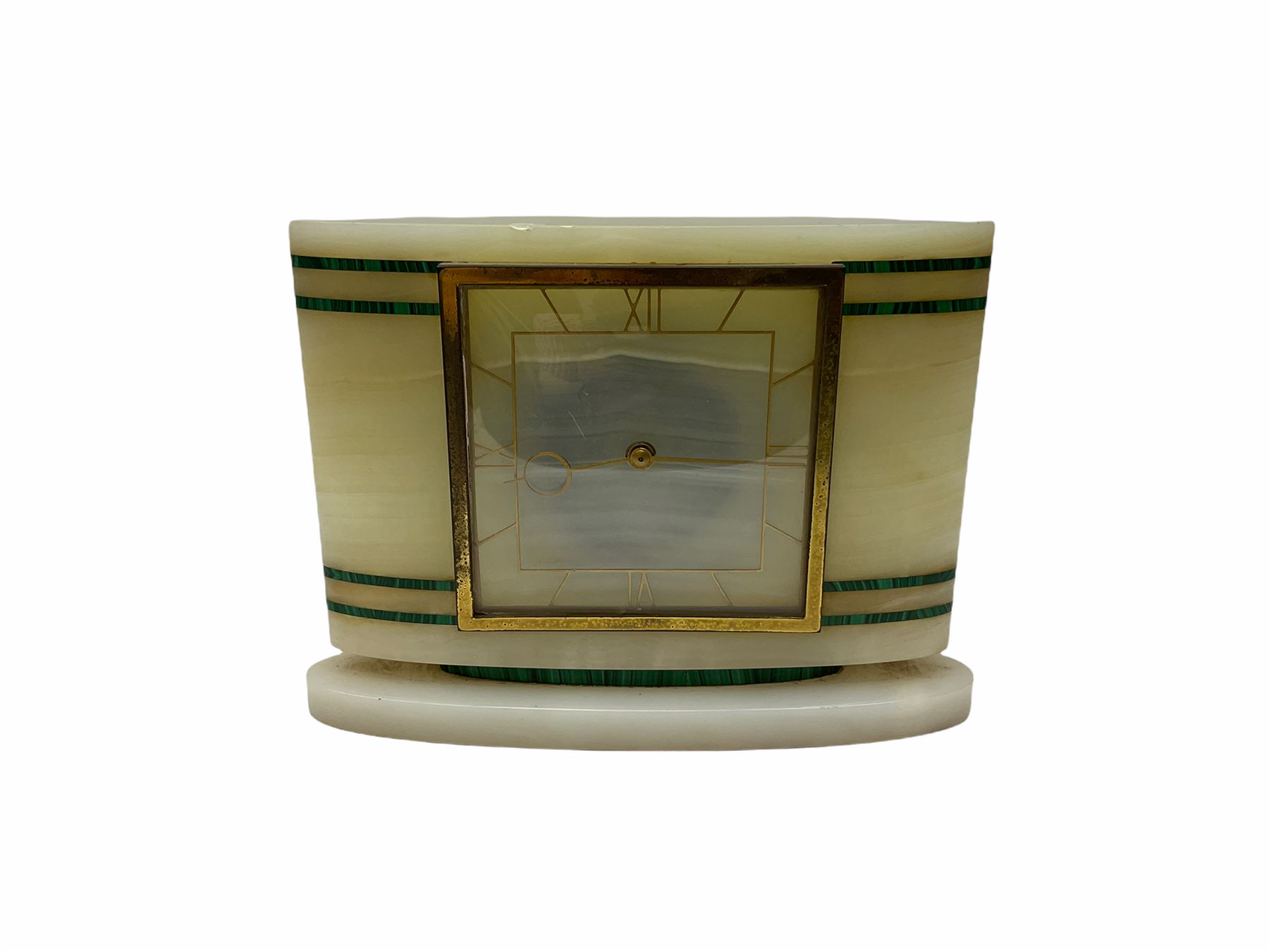 Smiths Industries SEC mains electric driven mantle clock in a rectangular Art Deco alabaster case inlaid with contrasting horizontal malachite inlay to the front, 4-1/2” square dial with brass roman numerals at 12, 3 , 6 and 9 and baton hands, with a square brass bezel and flat glass. Wiring untested, sold as a decorative item.
H 19 cm W 25 cm D 7 cm
With a small eight-day table clock in a faux tortoise shell case on a silver-plated base, 2” white dial with Arabic numerals and minute markers, steel spade hands, balance wheel movement with integral winding key. 
H 9.5 cm W 12 cm D 4 cm
