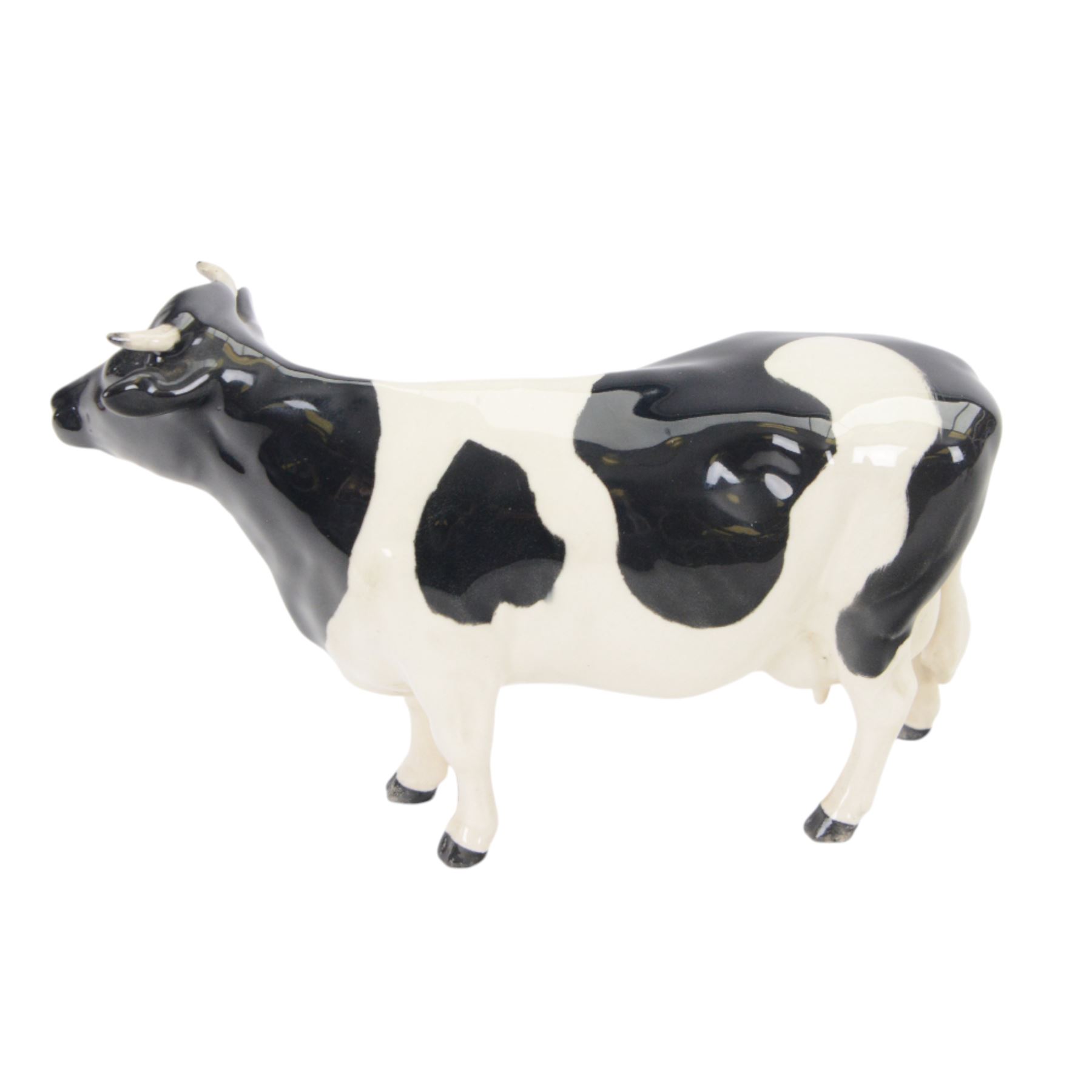 Beswick Friesian Cow family group, comprising Bull CH. Coddington Hilt Bar 1439, Cow CH. Claybury Leegwater 1362 and Calf 1249