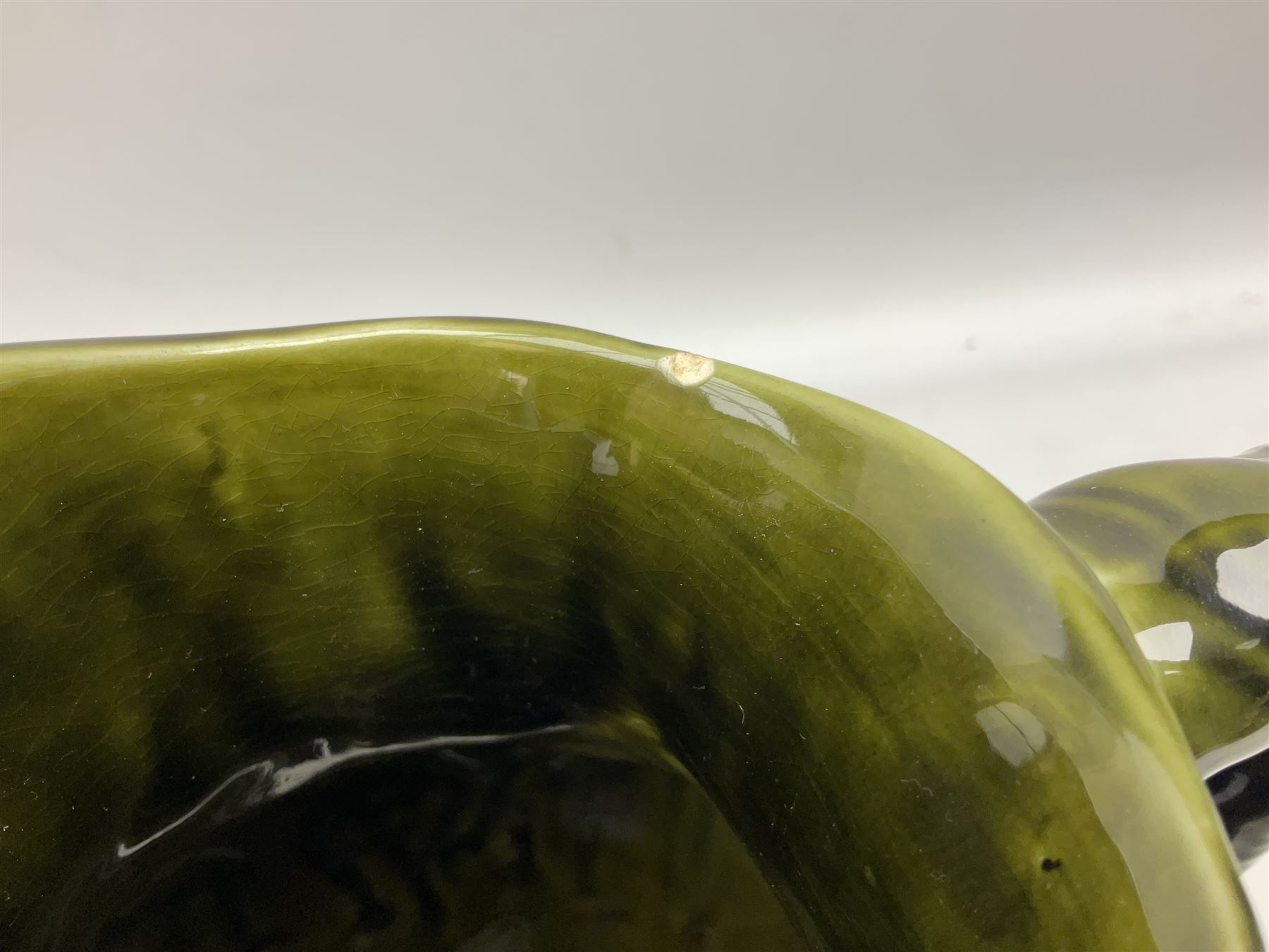 Three jardinières comprising West German Gerz example decorated in relief, Doulton Slaters example with frilled everted rim and a majolica example, and a further two Arthur Wood majolica jugs (5)