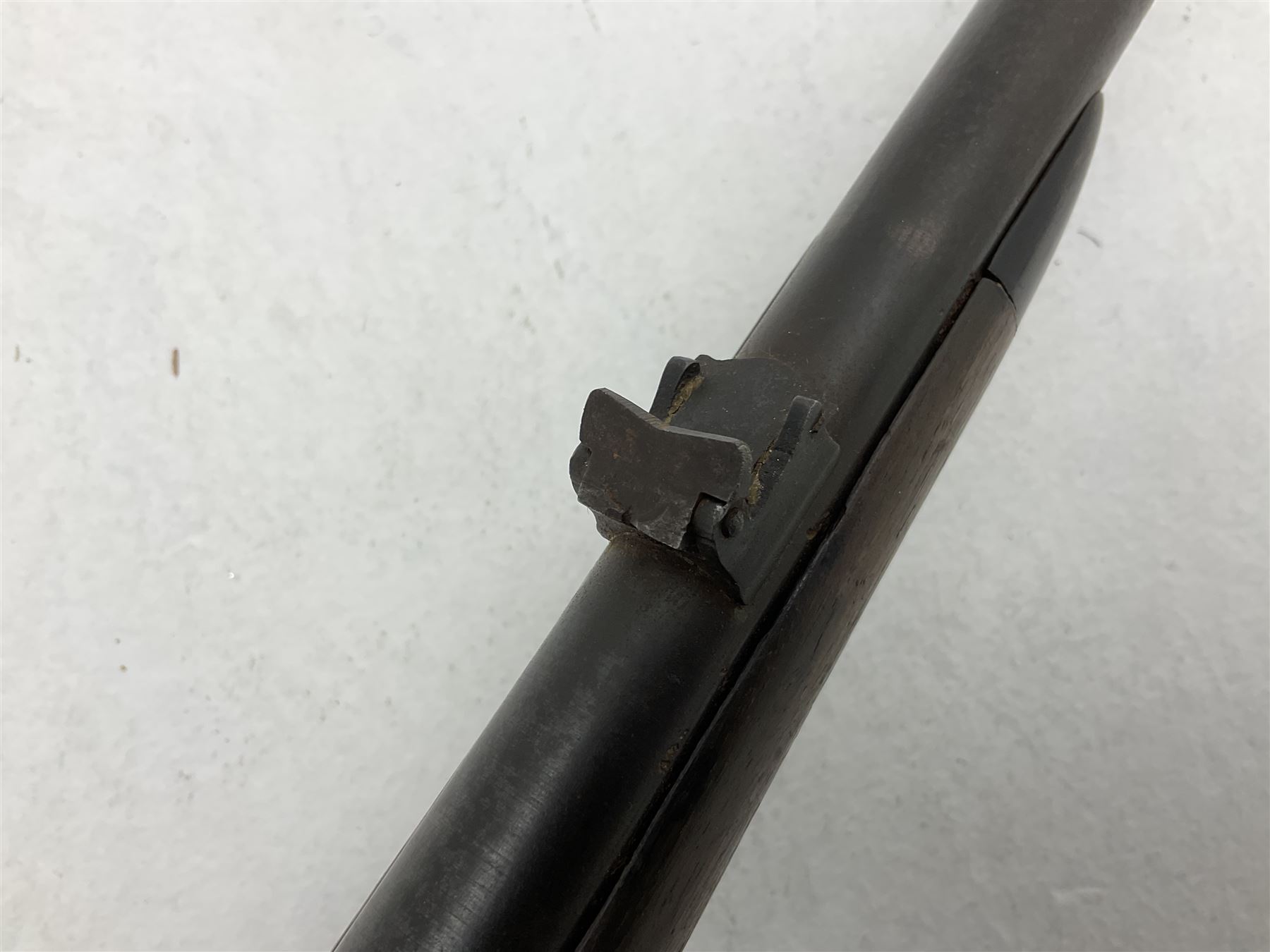 Late 18th century 7.2mm (approx. .28 calibre) Girandoni system single shot reservoir air rifle, the 62cm steel barrel with swivelling two-leaf rear sight, brass breech decorated with a sunburst and lever opening top loading, engraved steel lock-plates marked 'S. Gaskell' to the right side underneath the cocking lever, brass trigger guard,  leather covered steel butt reservoir of tapering conical form with brass ferrule and walnut fore-stock with horn mounts L107cm overall