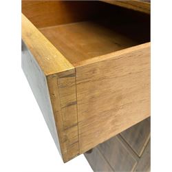 Early 20th century Art Deco walnut cocktail tallboy chest, fitted with double cupboard enclosing two shelves over two short and three long drawers, each with shell shaped handes