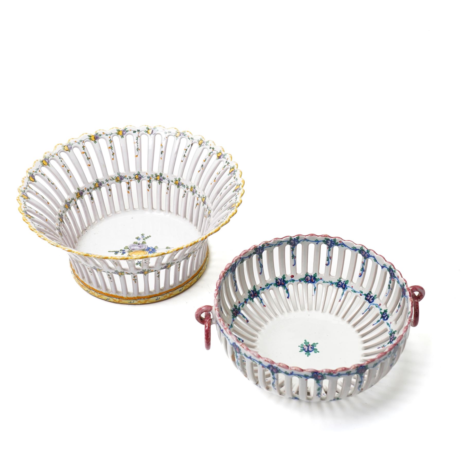 Two 20th century French faience openwork baskets, by Emile Tessier Malicorne, painted with polychromatic floral decoration, with scalloped rims, marked to base, larger 9cm (2)