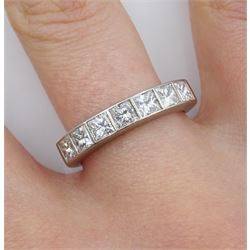 Platinum channel set seven stone princess cut diamond, half eternity ring, London 2007, total diamond weight 1.17 carat