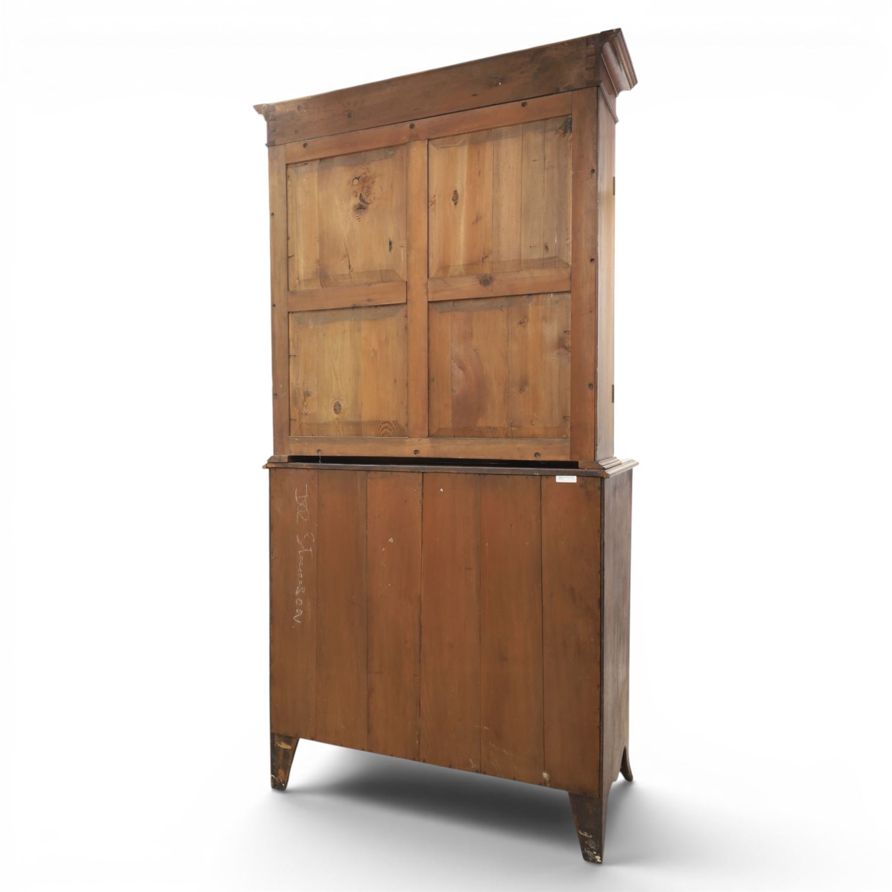 George III mahogany secretaire bookcase, the upper section with projecting cornice above astragal glazed doors, with three adjustable shelves, the lower section with secretaire drawer, fitted and with tooled leather writing surface, inlaid drawer fronts with brass handles, three graduating drawers below, raised on bracket feet