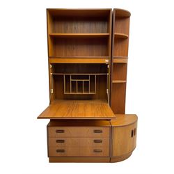 G-Plan - mid-20th century teak wall unit, fall-front enclosing fitted interior over three drawers, and corresponding corner unit, fitted with three open shelves over cupboard