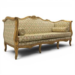 Louis XV design giltwood framed settee, the frame with applied foliate detail,  three loose seat cushions, upholstered in pineapple patterned fabric