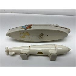 Ten WW1 crested china military models comprising submarine, four ships including Lusitania, four Zeppelins/balloons and an aircraft; various makers including Arcadian China, Swan China, Carlton China, Waterfall, Grafton China etc; various crests including Saint Neots, Great Yarmouth, Tewksbury, Swanage, Simons Town, Hull etc (10)