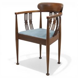 Early 20th century Hepplewhite style mahogany armchair, upholstered shaped back over pierced splat back with linked oval decoration, open arms and upholstered seat, on square tapering supports terminating in pad feet