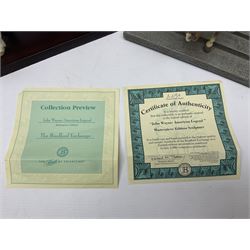 Beswick matte Hereford Bull, with stamped mark beneath, on wooden plinth, together with a limited edition Bradford Exchange John Wayne model, tallest H36cm