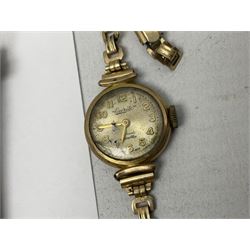 Rotary 9ct gold gentleman's quartz presentation wristwatch, on white leather strap, Everite 9ct gold ladies manual wind wristwatch, on gilt strap, silver paste stone set necklace, probably Scandinavian, silver ingot and other costume jewellery and watches