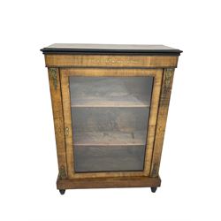 Victorian inlaid walnut pier cabinet, rectangular top over single glazed cupboard door enclosing two shelves, satinwood stringing and inlaid scrolling decoration and gilt metal mounts, on turned feet
