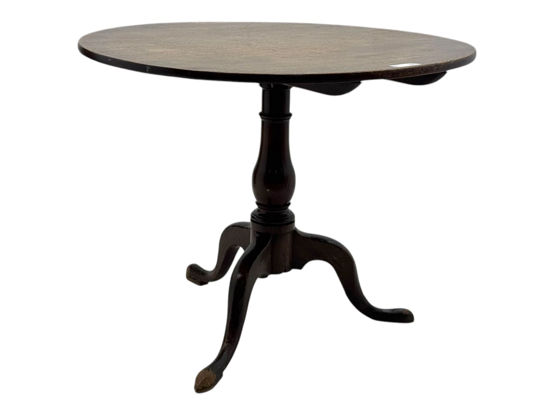 19th century mahogany tilt-top occasional table, circular top on a turned baluster column, raised on three splayed supports