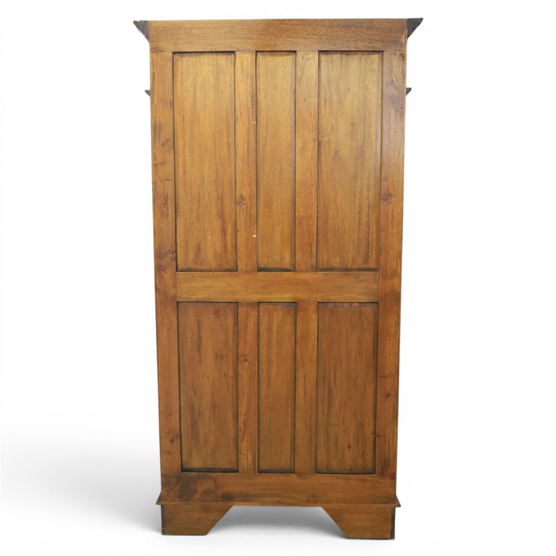 Hardwood open bookcase, fitted with five open shelves, applied carving to top facia