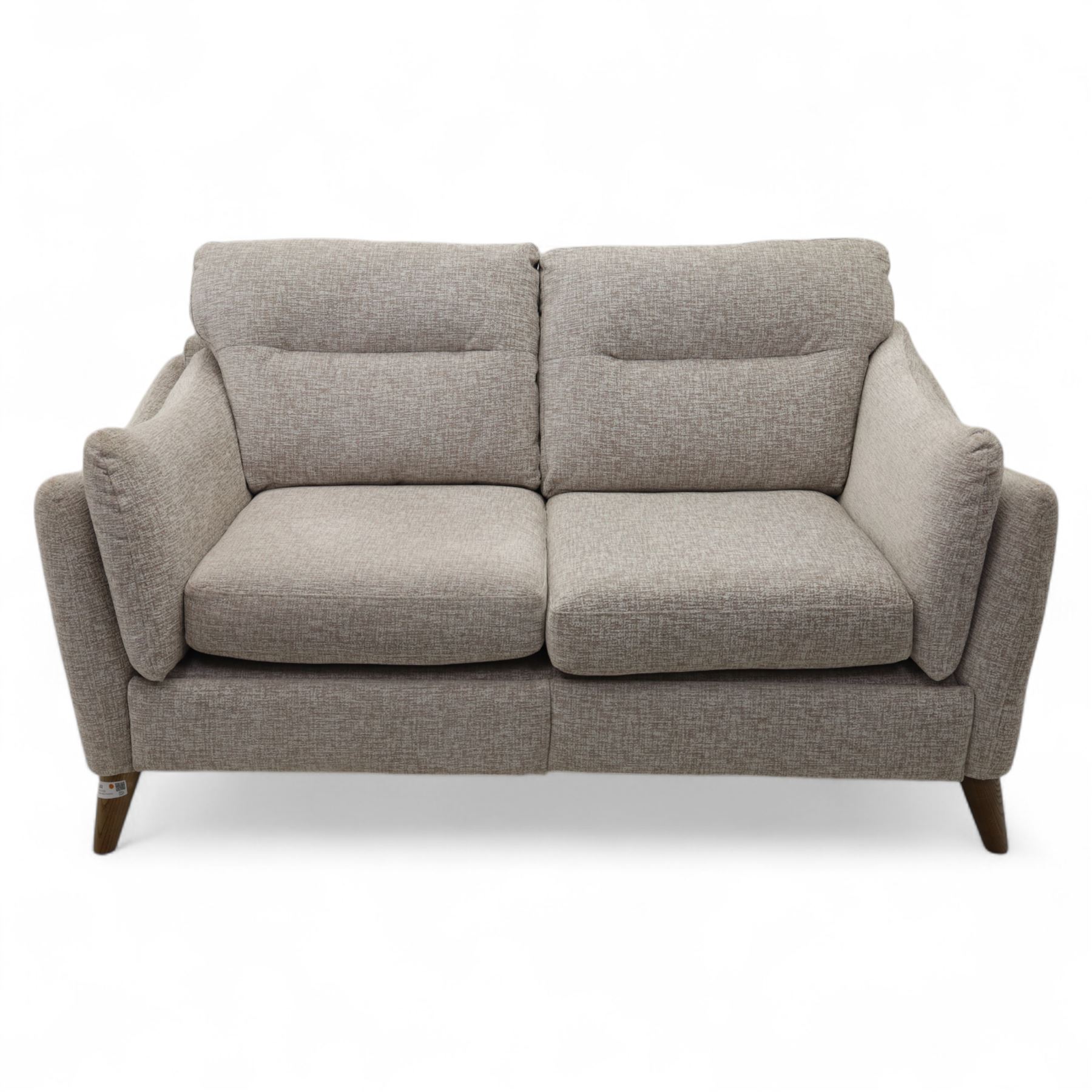 Ashwood - ‘Calypso’ 2-seater motion lounger, upholstered in light stone grey textured fabric with flared arms and split back cushions, fitted with dual electric recline controls, raised on stained tapering legs