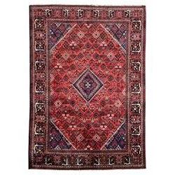 Persian Joshaghan crimson ground rug, stepped lozenge medallion surrounded by repeating foliate lozenge motifs, the border decorated with stylised plant motifs, within geometric guard stripes