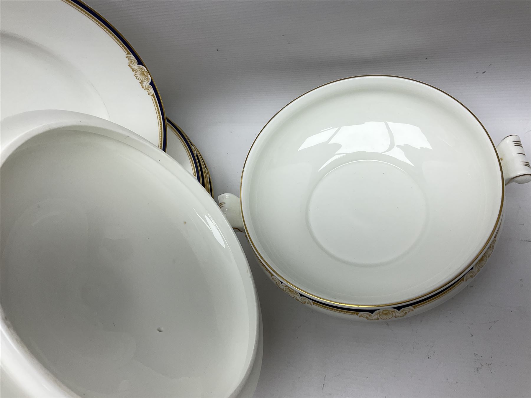 Wedgwood Cavendish pattern dinner service for twelve, comprising dinner plates, side plates, bowls, soup bowls, two tureens, saucer boat and sauce, together with matching part coffee service (82) 