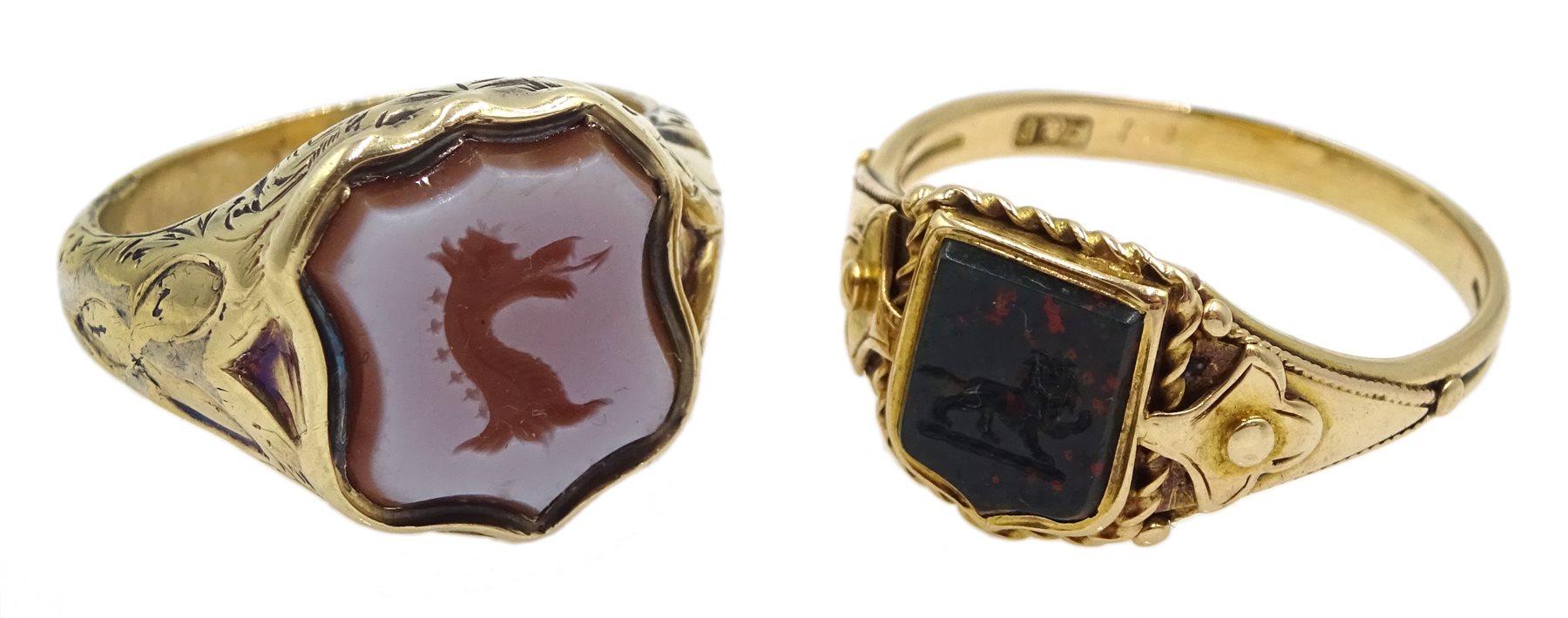 Victorian 15ct gold bloodstone lion intaglio, shield shaped signet ring and a 9ct gold agate dragon intaglio ring