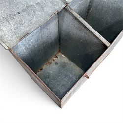 Early 20th century galvanised two division feed bin, sloped top