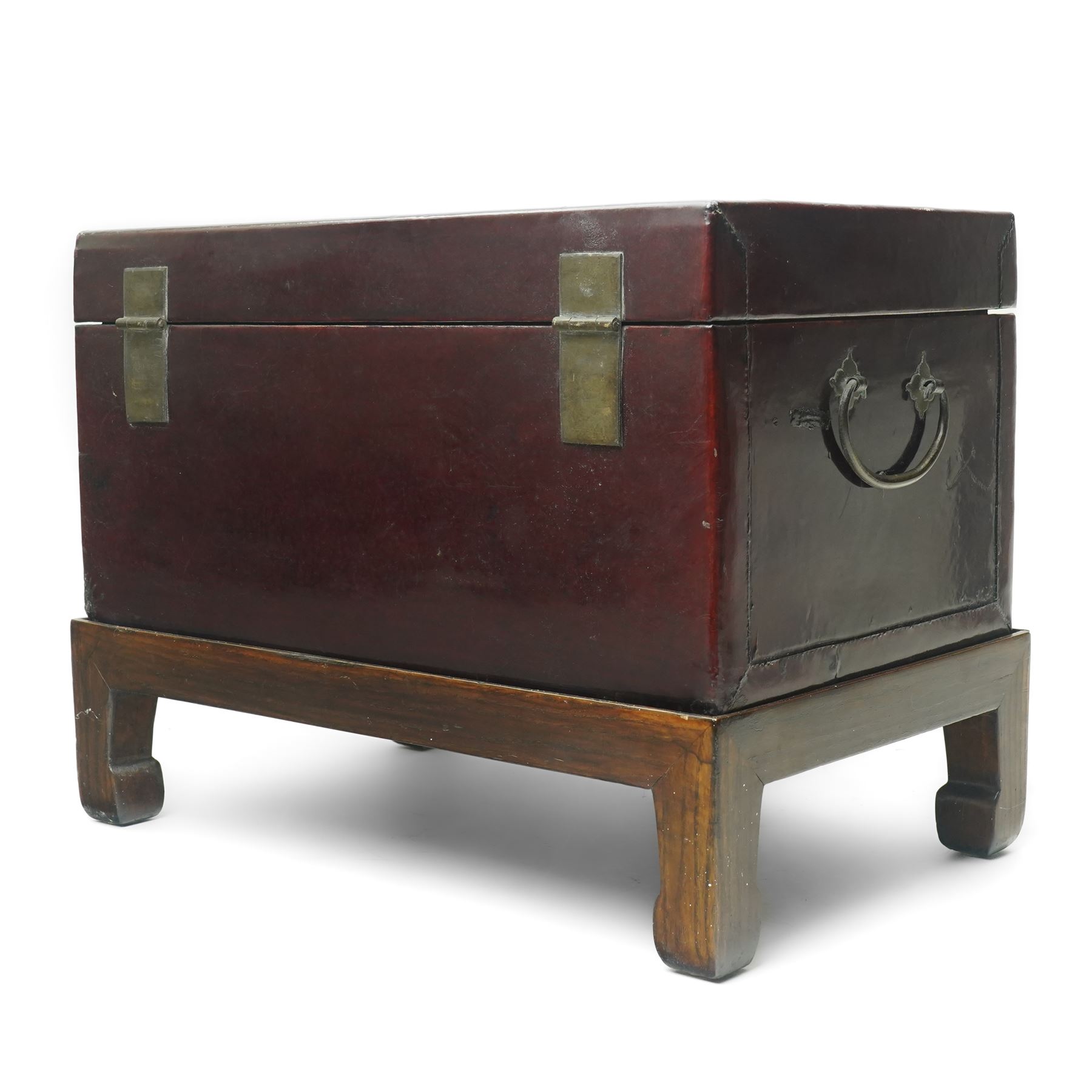 Chinese red lacquered chest on hardwood stand, with twin carrying handles, including stand H37cm x W49cm