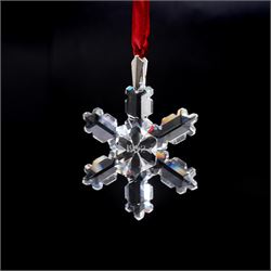 Eight Swarovski crystal snowflake Christmas ornaments, comprising years 1991-1998, some with certificates, boxed (8)