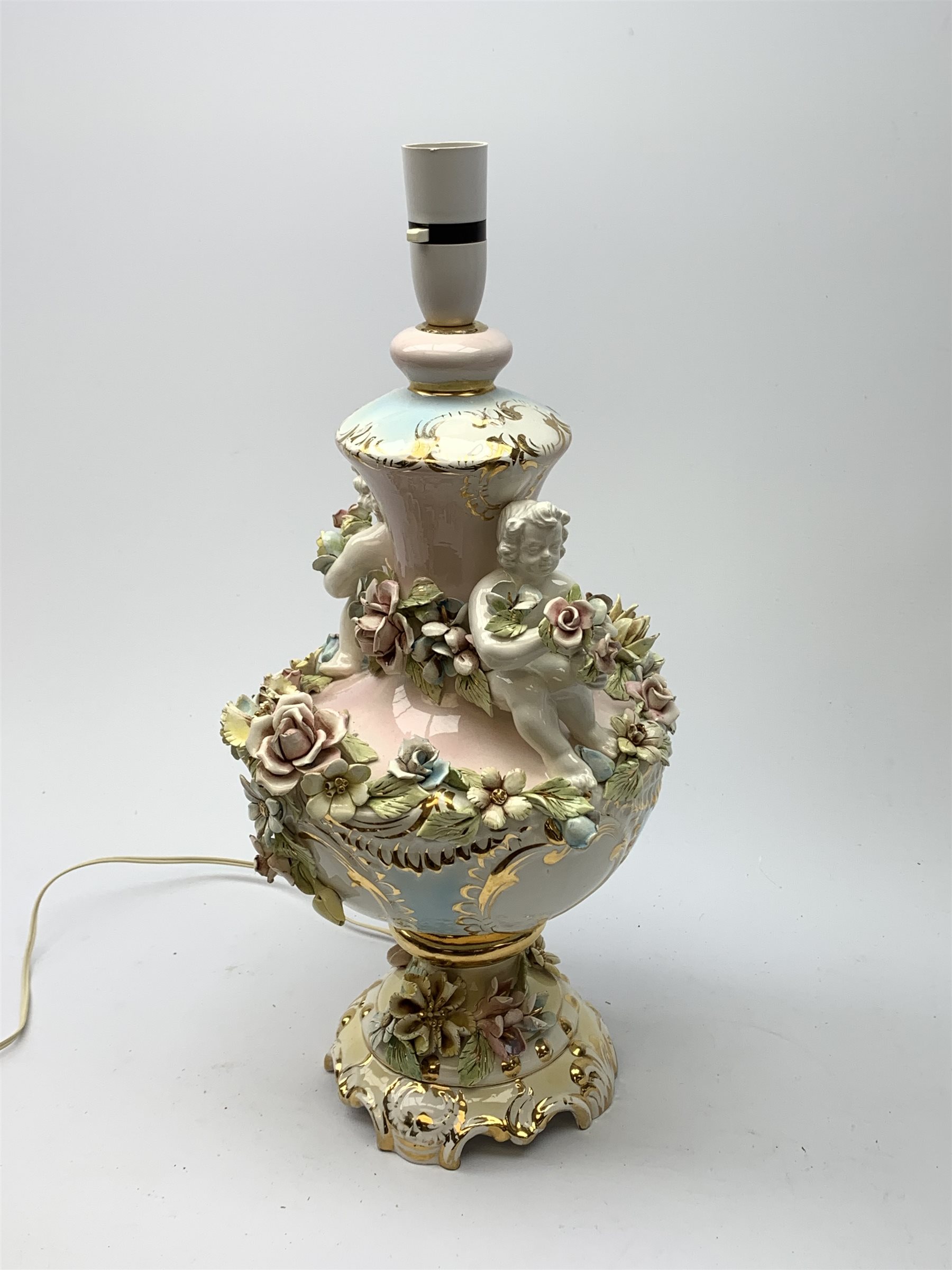 A Italian Capodimonte style lamp base, of pedestal urn form with