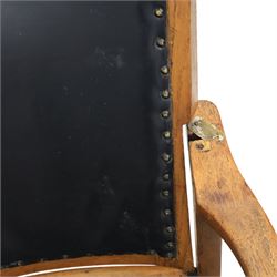 20th century oak recliner armchair, the curved back upholstered in leather with brass stud edging, hinged reclining back operated by side ratchet fittings, leather upholstered seat, shaped open arms, raised on cabriole legs