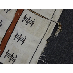  Sudanese woven camel hair and wool wall hanging with stylized motif on cream ground, 235cm x 132cm approx. Provenance:bought by the vendor in 1969 in Nyala, Northern Sudan and believed to have been woven by prisoners   