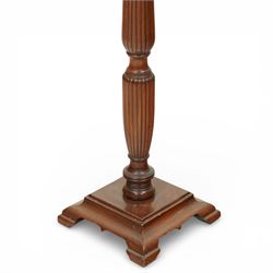 Hepplewhite design mahogany standard lamp, fluted column support with ring turned details, raised on a stepped square base with out-swept feet, fitted with a shaped red fabric lampshade