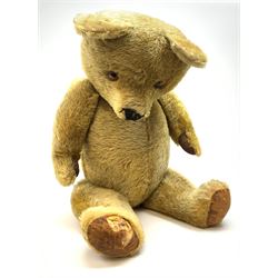 Very large Irish Tara bear c1950s with plush covered body, swivel jointed head with glass eyes and vertically stitched nose and mouth, jointed limbs with rexine pads and growler mechanism H37