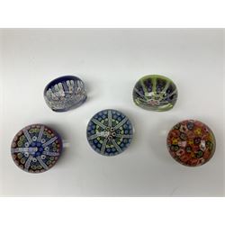 Five Millefiori glass paperweights, of differing designs, predominately by Strathearn